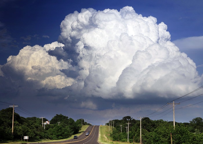 A thunderstorm cloud hangs in the sky near Edmond, Oklahoma on Wednesday afternoon, May 19, 2010. Many thunderstorms in central Oklahoma went super-cell and produced numerous tornadoes in the late afternoon and into the evening. (Photo: AP)