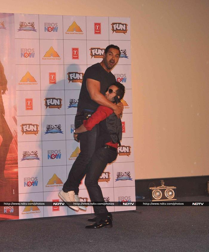 Mika Singh, who has sung the title song of the movie, had fun with John at the event.