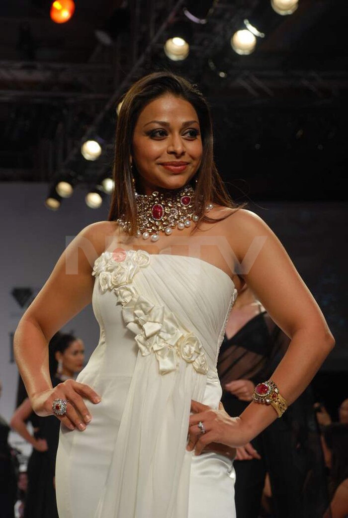 Ayesha Dharker's white gown is all but overshadowed by the serious ice on her neckpiece at the India International Jewellery Week.