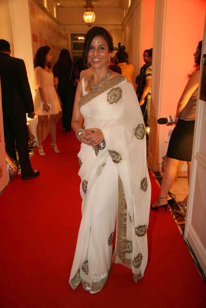 Sixty-plus Shobhaa De is fabulous in a white and gold saree.