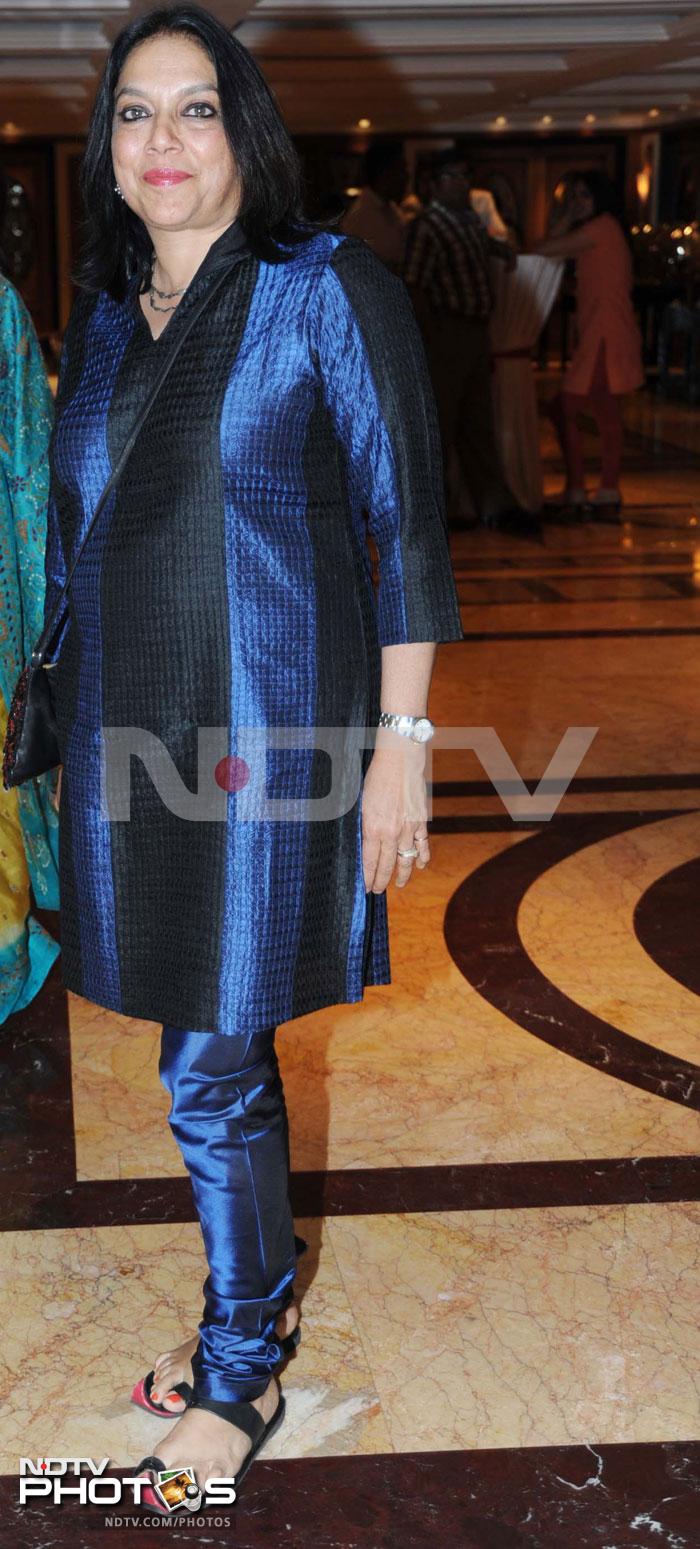 Filmmaker Mira Nair was spotted in a navy blue and black suit.