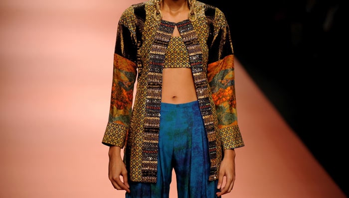 A model presents a creation by designers Ashima-Leena during the Wills India Fashion Week Autumn-Winter 2010 in New Delhi on March 25, 2010. India's leading fashion week event opened March 25 after a missing fire permit forced the cancellation of all shows on the first day. (Photos: AFP)