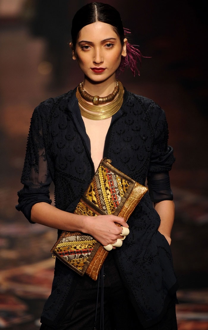 A model presents a creation by Indian designer Tarun Tahiliani during the Wills India Fashion Week in New Delhi on March 25, 2010.