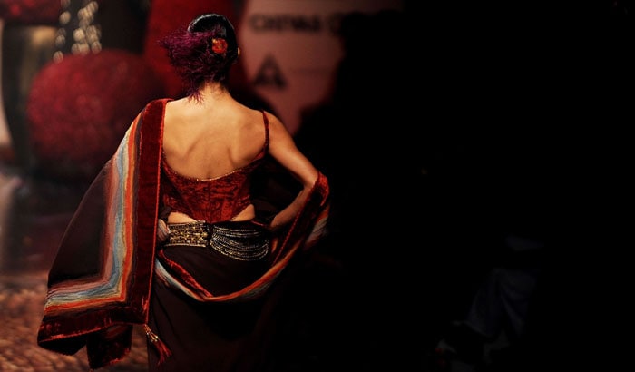 A model presents a creation by Indian designer Tarun Tahiliani during the Wills India Fashion Week in New Delhi on March 25, 2010.