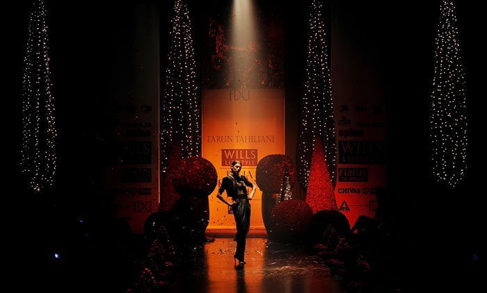 A model presents a creation by Indian designer Tarun Tahiliani during the Wills India Fashion Week in New Delhi on March 25, 2010.