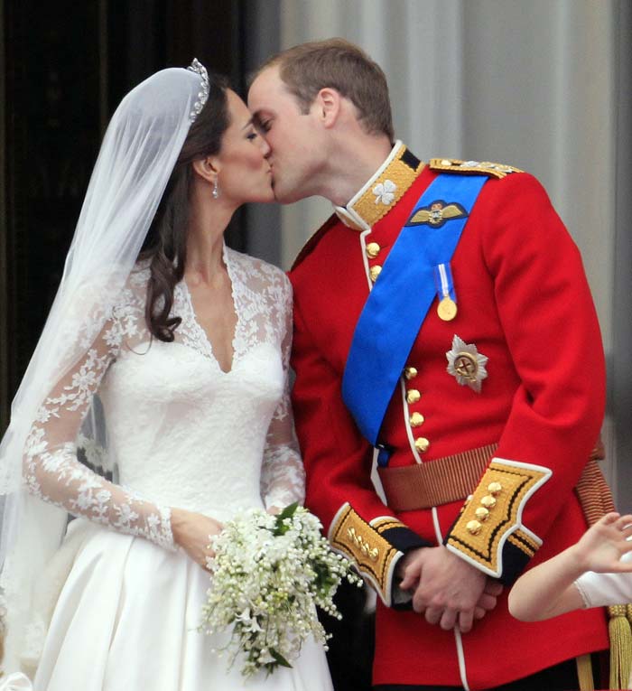 And not just one kiss. After the newlyweds shared a demure peck, the crowd wanted an encore. William and Kate obliged by puckering up again, this time for a slightly longer kiss