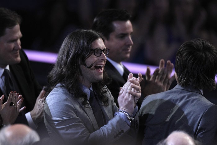 Kings of Leon react as they go on stage to accept the award for record of the year for 'Use Somebody' at the Grammy Awards on Sunday, Jan. 31, 2010, in Los Angeles. (Photo: AP)