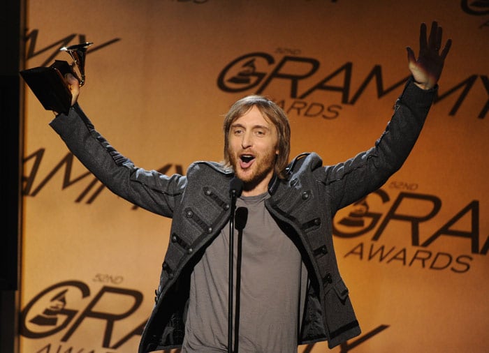 David Guetta celebrates after being presented with the Best Remixed Recording, Non-Classical award for When Love Takes Over during the Pre-Telecast award presentations at the 52nd Grammy Awards in Los Angeles on January 31, 2010. (Photo: AFP)