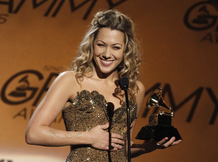 Colbie Caillat accepts the award for pop collaboration with vocal for "Lucky" at the Grammy Awards on Sunday, Jan. 31, 2010, in Los Angeles. (Photo: AP)