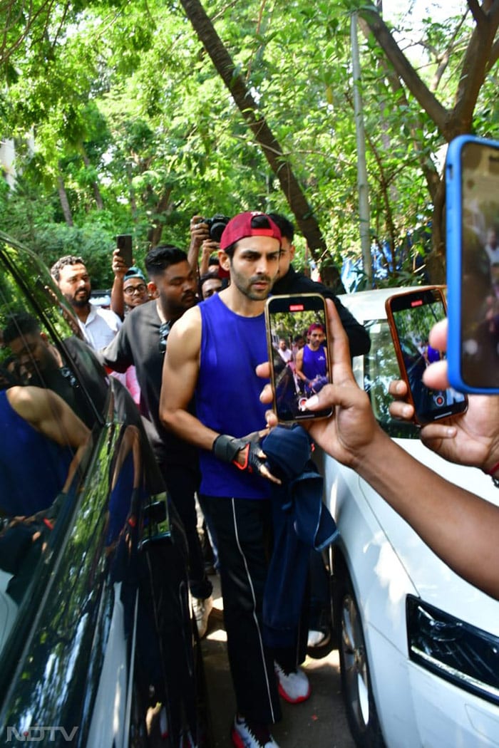 Kartik Aaryan topped track pants with a blue t-shirt. (Image courtesy: Varinder Chawla)