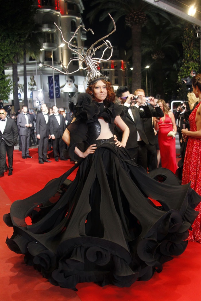 A guest arrives for the screening of <I>Outrage</I> presented in competition at the 63rd Cannes Film Festival on May 17, 2010 in Cannes. (Photo AFP)