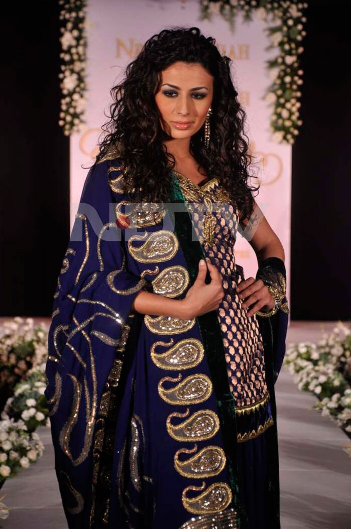 A model walking the ramp for Neelam and Nriti Shah.