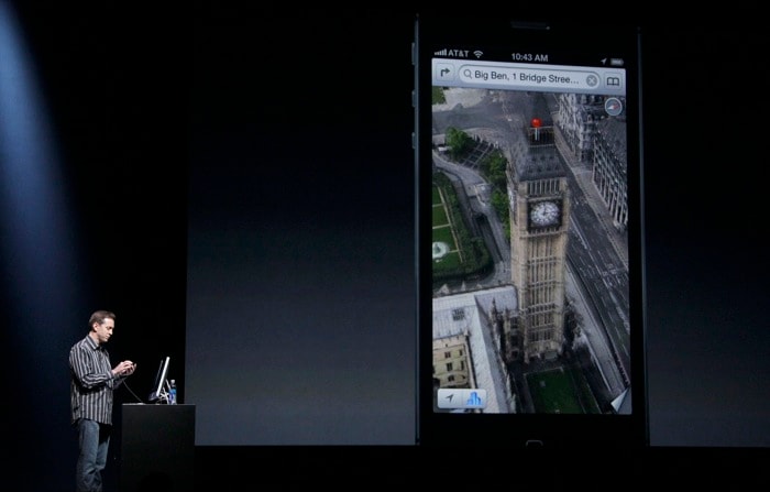 Scott Forstall, Apple's senior vice president of iOS Software, shows features on the iPhone 5.