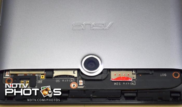 The micro-SIM and microSD card slot are located beneath the removable strip at the back of the tablet.