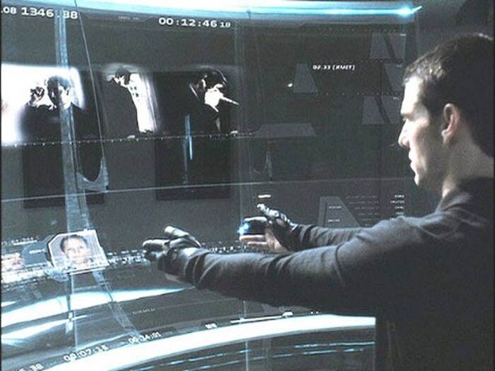 In the beginning of Minority Report, Tom Cruise uses his hands to find information in three-dimensional computerised space. (Image Courtesy: Dreaworks Pictures)