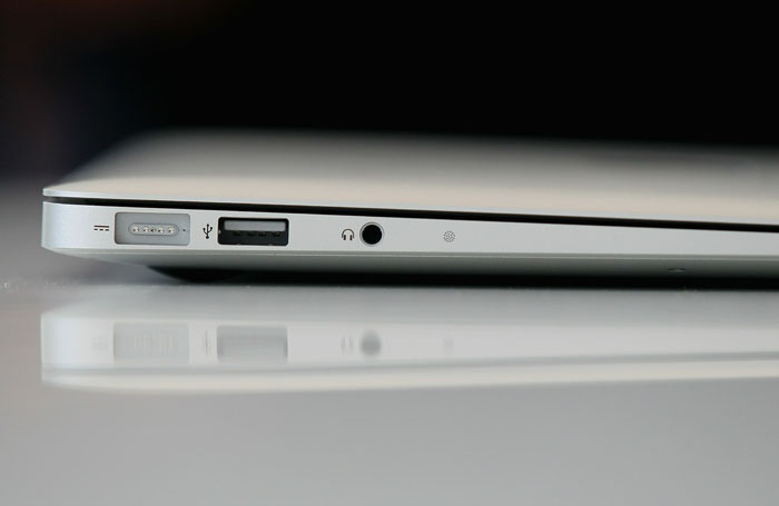 The new MacBook Air is displayed during an Apple special event at the company's headquarters in Cupertino, California. Apple CEO Steve Jobs announced the new MacBook Air in eleven and thirteen inch models starting at $999. He also announced the OSX Lion operating system for Mac computers.(Photo AFP)