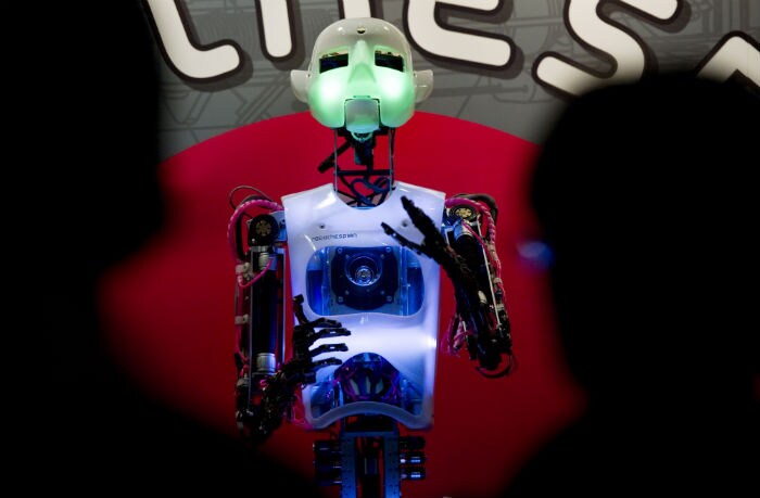Visitors enjoy the antics of a life-sized humanoid robot named "RoboThespian". The robot has been created to educate, communicate, interact and entertain. It costs $90,000 and is already being used by NASA. (Photo: AFP)