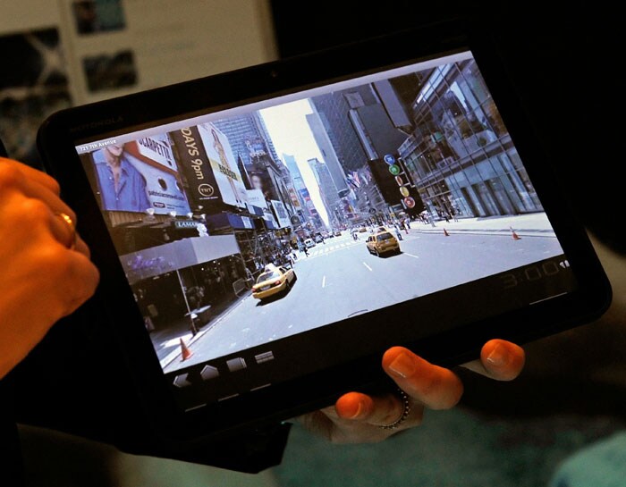 The Motorola Xoom Android Honeycomb tablet is displayed during a press event at the CES 2011.The device will pack in a 1GHz dual-core Tegra 2 chipset and will have a 10.1-inch screen. With a 1280 x 800 resolution, a 5 megapixel camera, 720p video recording and 1080p video playback, Bluetooth 2.1 + EDR, 802.11n WiFi, and 32GB of onboard storage, this device certainly poses to be an iPad killer. The battery is capable of 10 hours of video playback. The device is expected to launch in Q1 of 2011.
