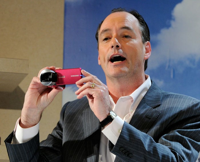 Samsung Electronics America's President of Consumer Business Division Tim Baxter displays the Samsung HMX-Q10, full HD camcorder featuring Samsung's new Switch Grip technology at CES 2011.
