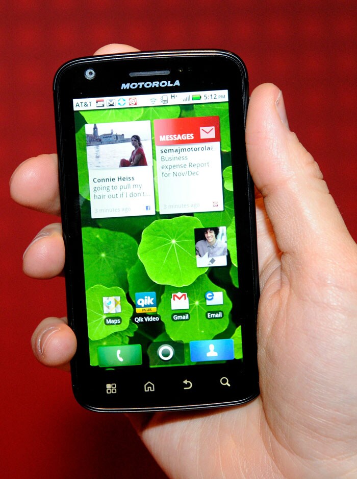 The Atrix 4G smartphone by Motorola is displayed during a press event at the CES 2011. The device boasts of a dual-core Tegra 2 processor and runs Android 2.2. The device has a whopping 1GB RAM and 16GB internal memory expandable upto 32 GB. It has a 5MP camera for stills and a massive 1930 mAh battery.