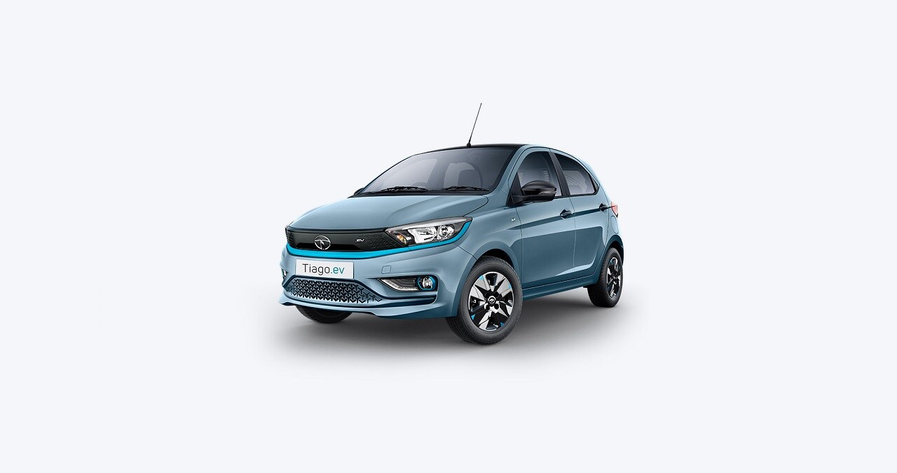 Tata Tiago EV के सेफ्टी फीचर्स: सेफ्टी फीचर्स की बात करें तो Tata Tiago EV में ड्राइवर/को-ड्राइवर एयरबैग्स, ईबीडी के साथ एबीएस, प्रीटेंसनर के साथ सीट बेल्ट, चाइल्ड सेफटी रियर डोर लॉक, रिवर्स पार्किंग एसिस्ट, फॉलो मी होम हेडलेंप, स्पीड डिपेंडेंट ऑटो डोर लॉक, इंपेक्ट/एक्सिडेंट पर ऑटो बैटरी कट ऑफ, इंपेक्ट सेंसिंग और ऑटो डोर अनलॉक और पंक्चर रिपेयर किट आदि है।