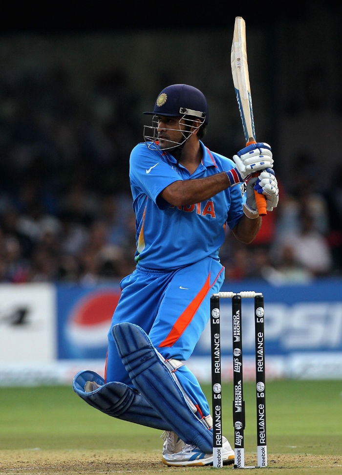 <b>Amiy Arun Srivastava -</b>  Sakshi bhabhi... Dhoni forgetting his helicopter shot, he looks over defensive. Ask Dhoni to take some batting tips. Please go to Mohali match, you are lucky charm for him. (Photo: Getty Images)