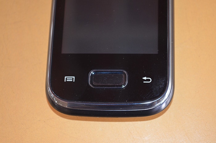 The front of the smartphone is clean with the capacitive Menu and Back buttons and the Home button.