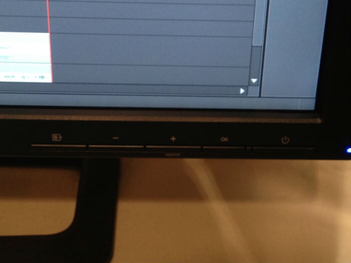 The workstation monitor's power, menu and volume buttons are located in the front.