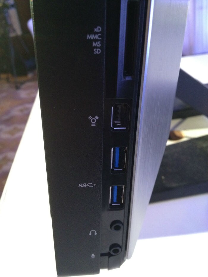 The right side of the workstation houses various ports and a multi reader card slot.