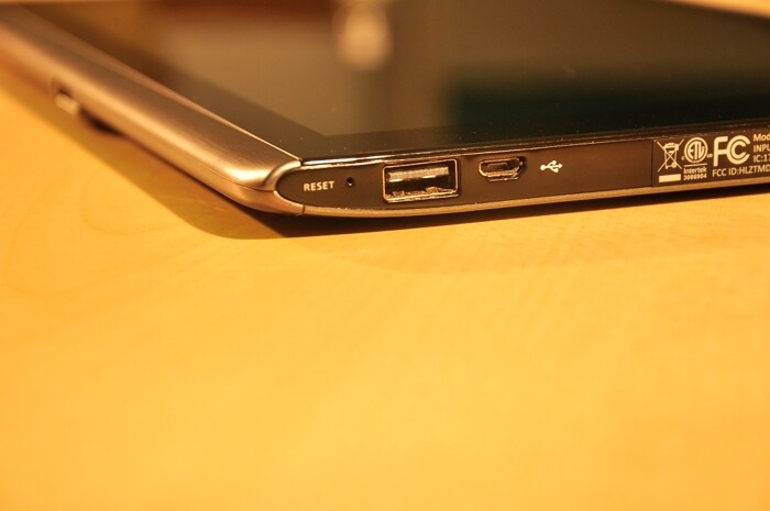 On the bottom end of the device Acer has provided a full sized USB-port, a micro USB slot and the charging point. (Photo : Harshit Walia)