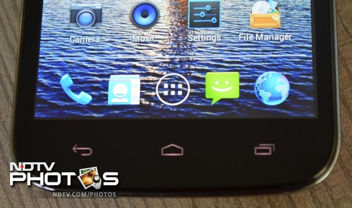 The phone features three capacitive touch buttons.