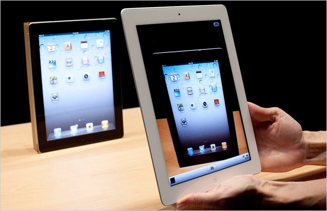 <b>NY Times</b><br><br>
If you thought that purchasing the iPad was a logical decision, NYT's David Pogue will tell you other wise. He believes it is an emotional decision, ?The iPad's appeal is more emotional than rational. Once you get it in your hands, you get caught up in the fascination of manipulating on-screen objects by touching them. Apple sold 15 million iPads in nine months, created a mammoth new product category and started an industry of copycats. Apparently, it doesn't pay to bet against Steve Jobs's gut instinct.? (Photo: NYT)<br><br>
<a href=' http://www.nytimes.com/2011/03/10/technology/personaltech/10pogue.html?_r=2 '' "nofollow" style='color: rgb(0, 51, 153);' target='blank'> Read the complete NYT review here.</a></b>