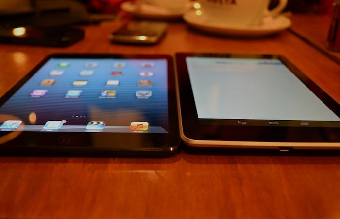 The Nexus 7 (right) is visibly thicker than the iPad mini, but over half an inch narrower. The build quality of the Nexus 7, however, is nowhere near iPad mini's.