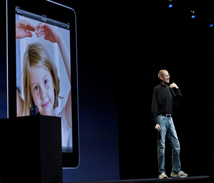 The next enhancement in line is a whole new camera system built into iPhone 4. The new handset will have a 5 megapixel sensor with a backside illuminated sensor compared to the 3 MP camera in older models.<br><br> As an added bonus, the new camera would also record HD video - 720p at 30fps. "Record and edit HD video right on your phone. It's pretty remarkable," Jobs said.<br><br> The experience for iPhone 4 users would be enhanced through a custom built app called iMovie for iPhone. According to Randy Ubillos, Apple's chief architect of video apps, it would allow users to "record HD video and edit with beautiful transitions and titles, all on the device you carry with you every day." Even music can be added from iTunes, besides importing Geolocation information to titles. (Photo: AFP)