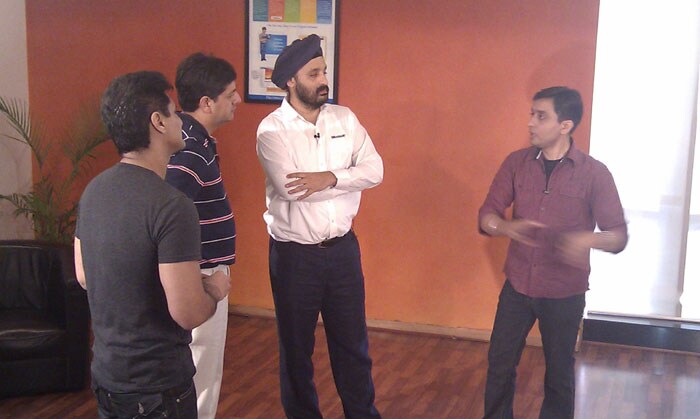 Rajiv, Vikram, Jaspreet and Karan debating about the pros and cons of Microsoft's Kinect. (Photo: Sameer Mitha)