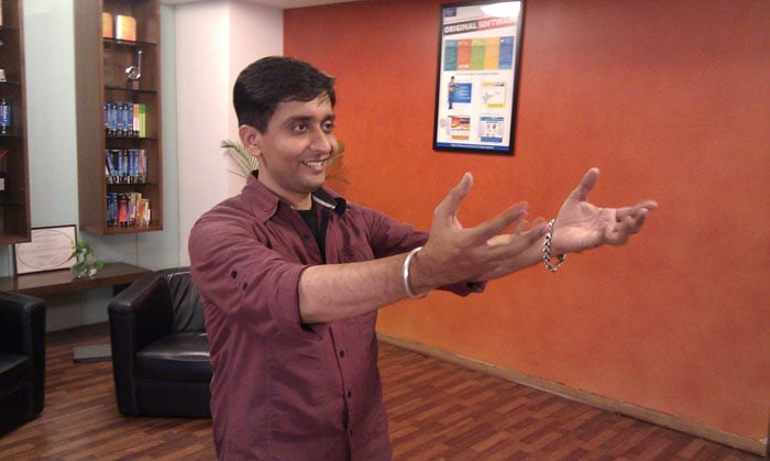 Gaming Guru Karan Patheja enjoying sweet moments with his virtual pet. Kinectimals; a virtual pet game for Kinect. (Photo: Sameer Mitha)