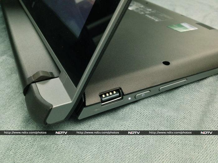 You can switch between notebook and stand mode just by pushing the screen back all the way and folding the keyboard deck underneath it.