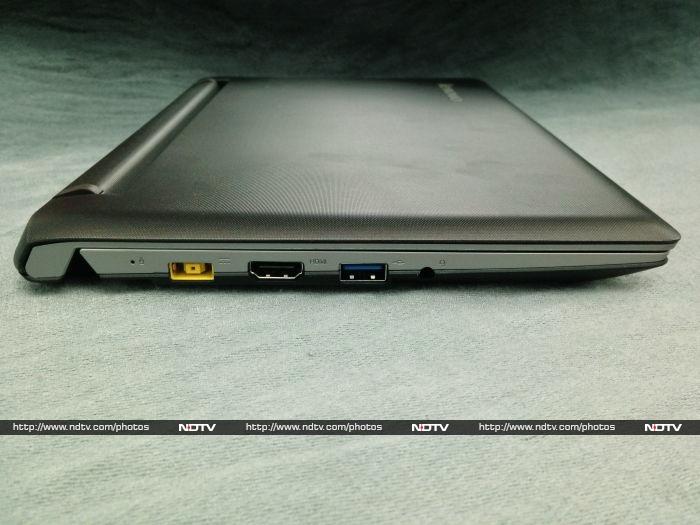 The left edge has a flat power socket, HDMI video output, USB 3.0 port and stereo headset port.