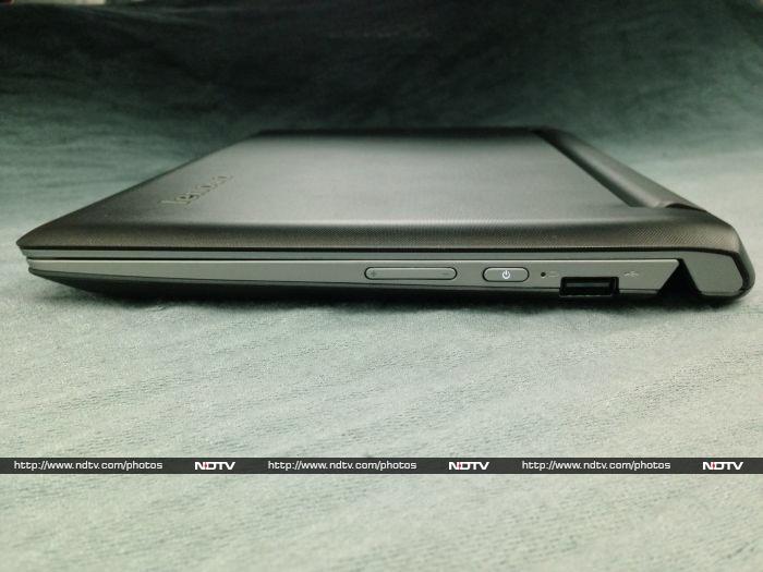 The right edge has volume buttons, the power button, and a USB 2.0 port.
