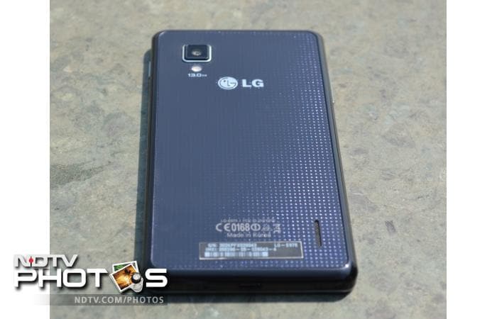 The back is made of glass with a crystal pattern.