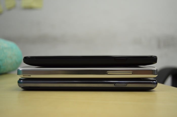 The Micromax Superfone Canvas A100 (top) and iBall Andi 5c (bottom) have power buttons on the right side while the Spice Stellar Horizon Mi-500 (centre) has the volume rocker.