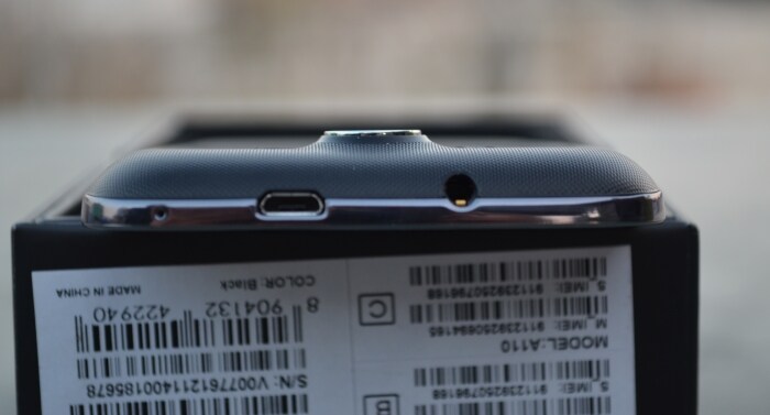 A micro USB port and a 3.5mm headphone jack sits on the top.