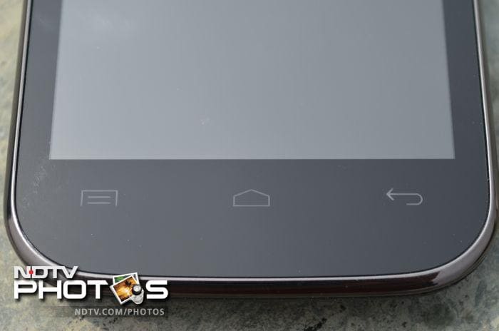 The phone features three capacitive touch buttons.