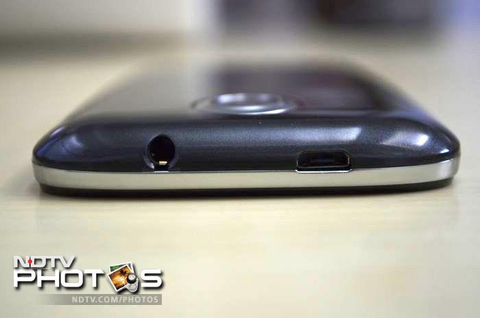 The micro-USB port and 3.5mm headset jack is at the top of the phone.