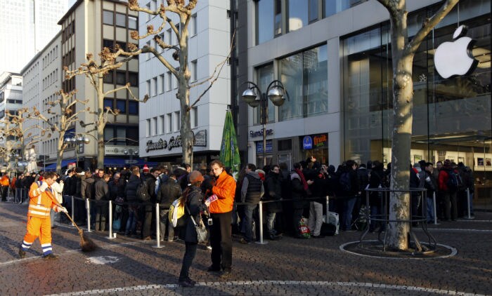 Large crowds outside an Apple store have become a staple on launch day.