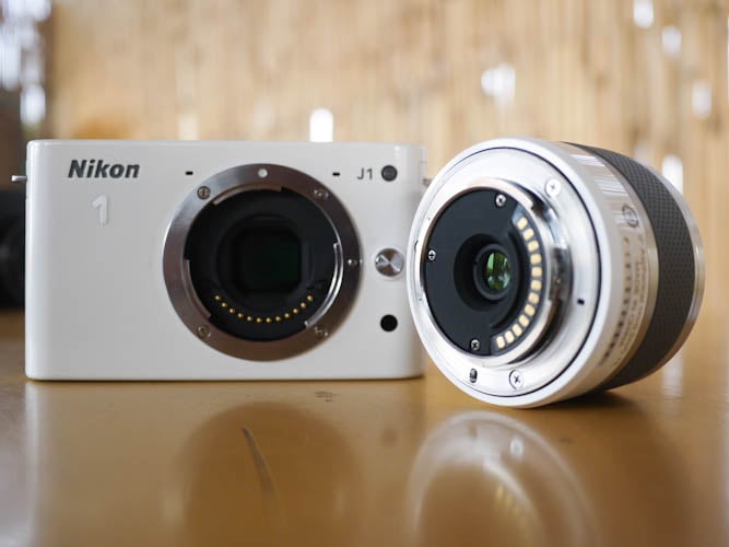 Nikon J1 houses the new CX format 10 megapixel sensor and comes with two zoom lenses.