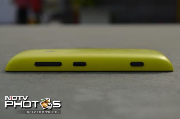 The volume rocker, the power/screen lock key, and a camera button, are located at the right side of the phone.