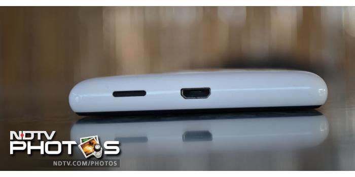 The bottom of the phone features a micro usb port along with the speaker outlet.