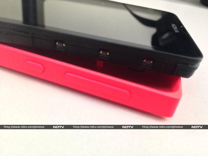 Nokia has designed the buttons into the outer shell, and they have the same colour as the shell too.