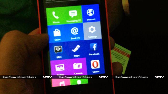 The main menu is made up of large colourful tiles similar to the Windows Phone interface. You can rearrange these as you like.